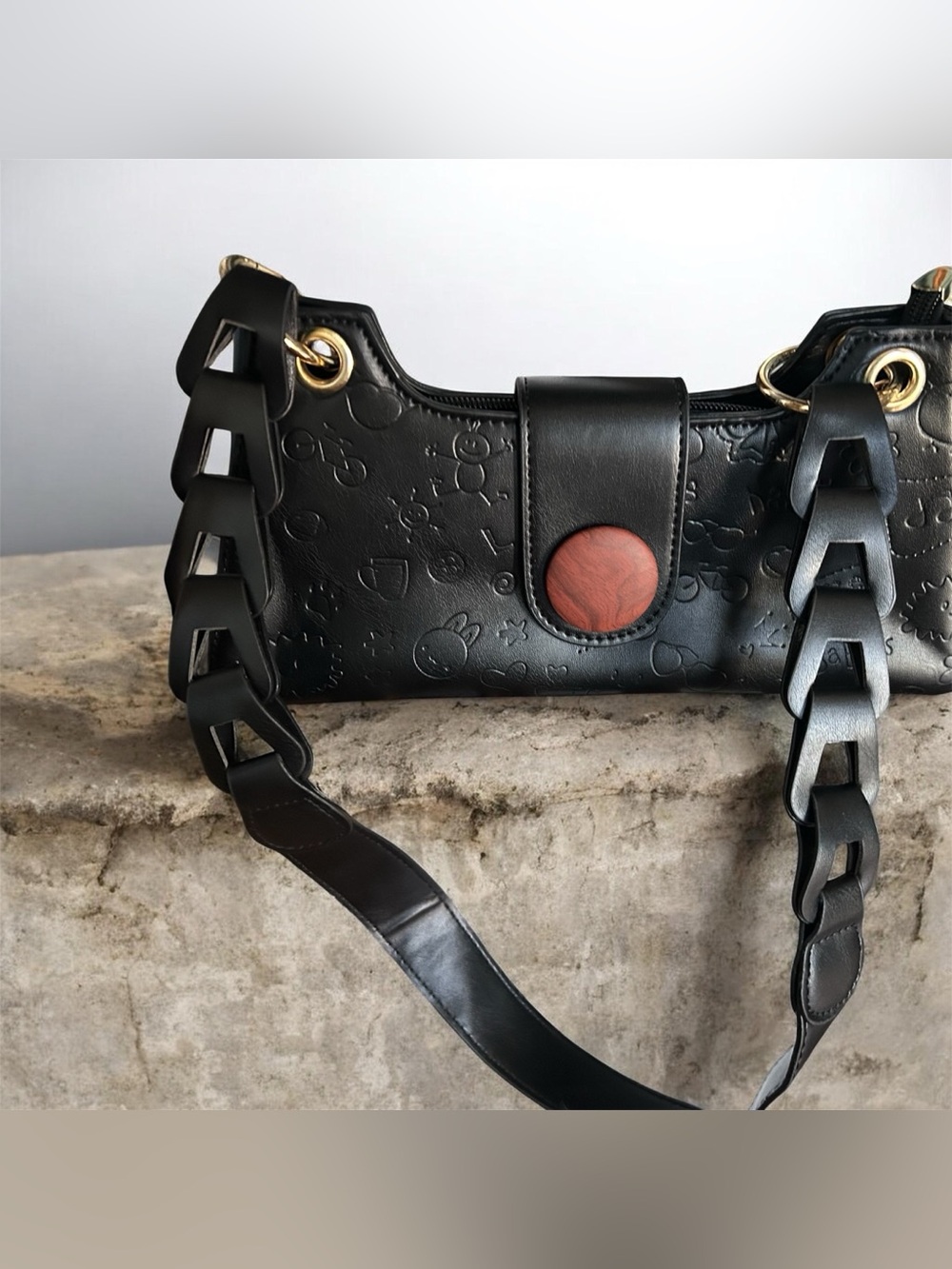 Black Shoulder Bag with Brown Circular Accent